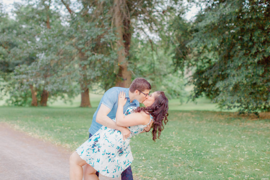 well dress cute outfit couple dipping during and engagement session 