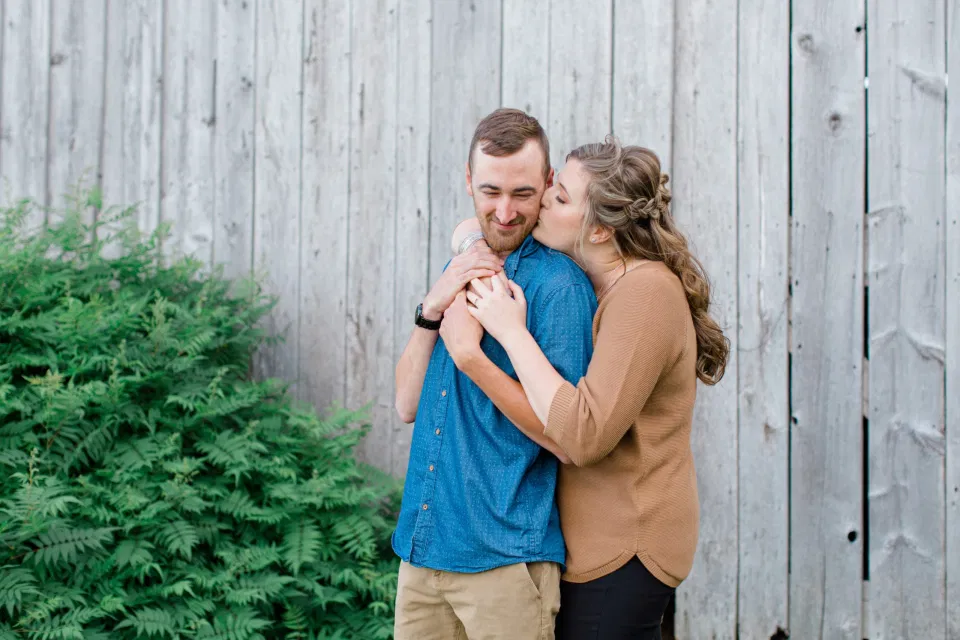Engagement Session Inspiration - Natural Engagement Session Posing - Ideas for what to wear for Engagement Photography, Modern Engagement Session Inspiration Wardrobe Ideas. Unsure of what to wear for your engagement photos, we've got you! Romantic brown with black leggings for Summer Engagement in Almonte. Grey Loft Studio is Ottawa's Wedding and Engagement Photographer for Real couples, showcasing photos that are modern, bright, and fun.