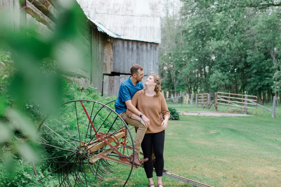 Farm Engagement Session Inspiration - Blue and Brown Engagement Session Inspiration - Natural Engagement Session Posing - Ideas for what to wear for Engagement Photography, Modern Engagement Session Inspiration Wardrobe Ideas. Unsure of what to wear for your engagement photos, we've got you! Romantic brown with black leggings for Summer Engagement in Almonte. Grey Loft Studio is Ottawa's Wedding and Engagement Photographer for Real couples, showcasing photos that are modern, bright, and fun.