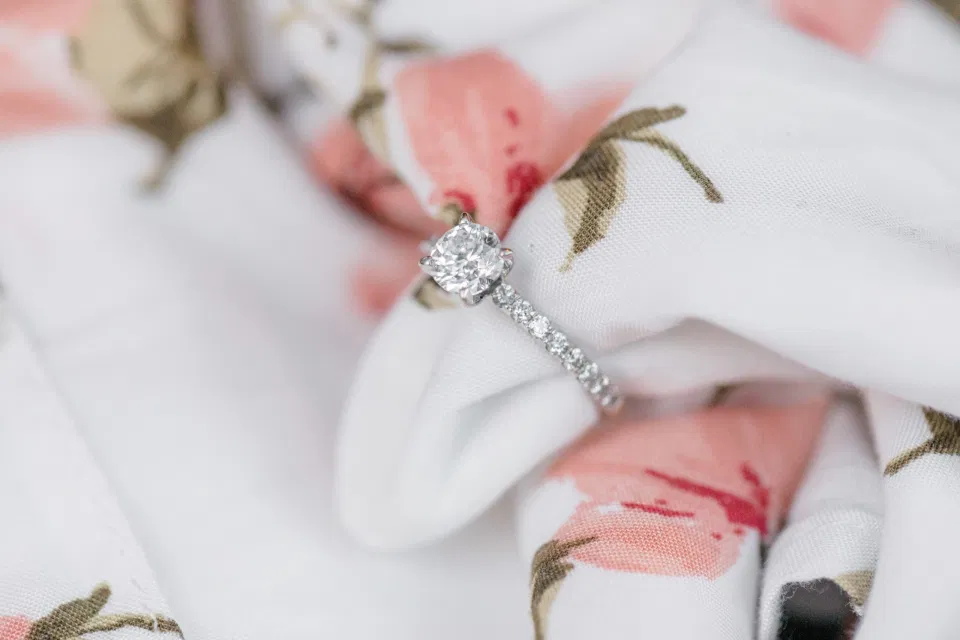 Beautiful Engagement Ring - Posed on Dress -  Grey Loft Studio