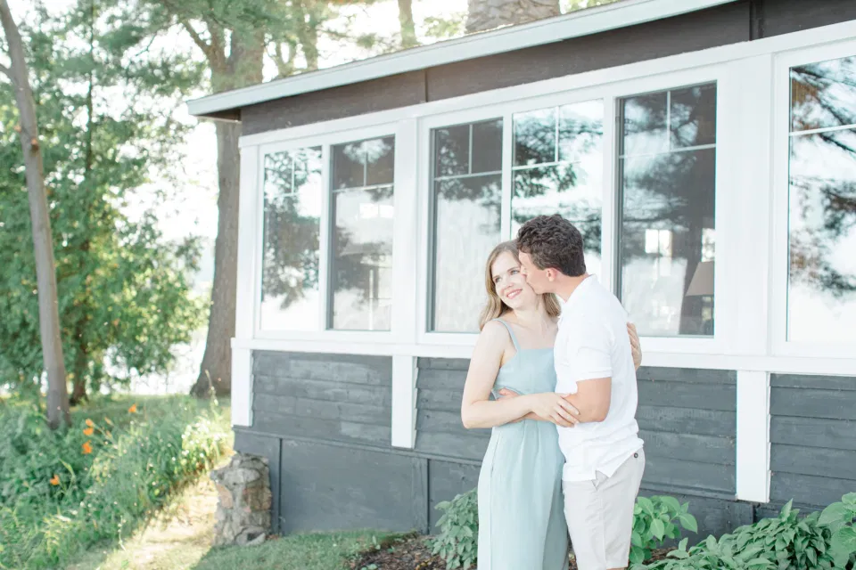 Ideas for what to wear for Engagement Photography, Modern Engagement Session Inspiration Wardrobe Ideas. Cottage Engagement Session. Unsure of what to wear for your engagement photos, we've got you! Romantic blue Romper and neutral Shirts and polo. Boat Shoes and Flip Flops. Engagement in Gananoque. Grey Loft Studio is Ottawa's Wedding and Engagement Photographer Videographer for Real couples, showcasing photos that are modern, bright, and fun.