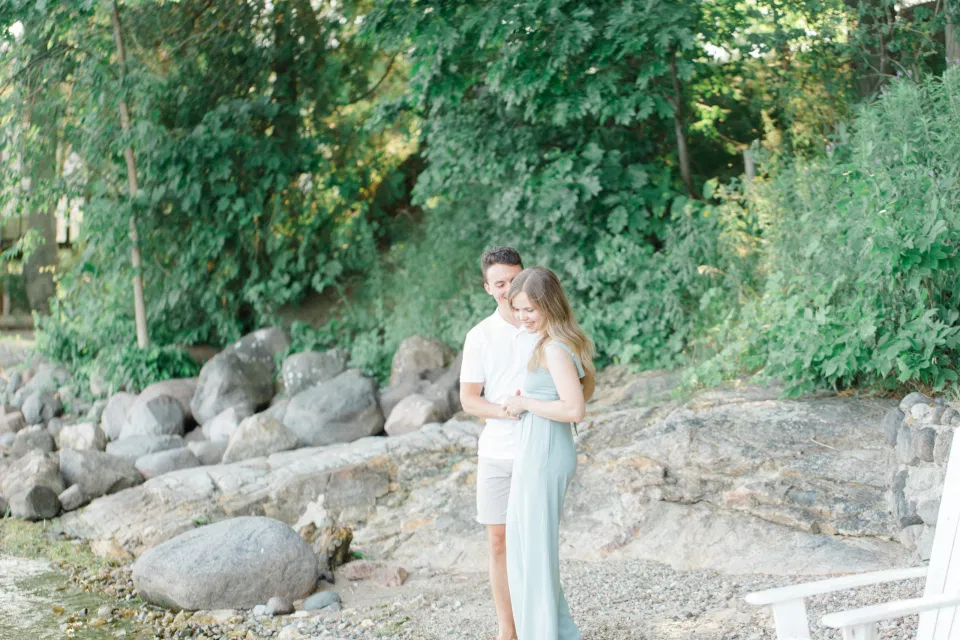 Ideas for what to wear for Engagement Photography, Modern Engagement Session Inspiration Wardrobe Ideas. Unsure of what to wear for your engagement photos, we've got you! Romantic blue Romper and neutral Shirts and polo. Boat Shoes and Flip Flops. Engagement in Gananoque. Grey Loft Studio is Ottawa's Wedding and Engagement Photographer Videographer for Real couples, showcasing photos that are modern, bright, and fun.